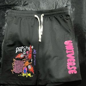 black shorts with space designs